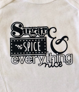 Sugar & Spice Gerber brand onesie available in sizes from 0-24 months.